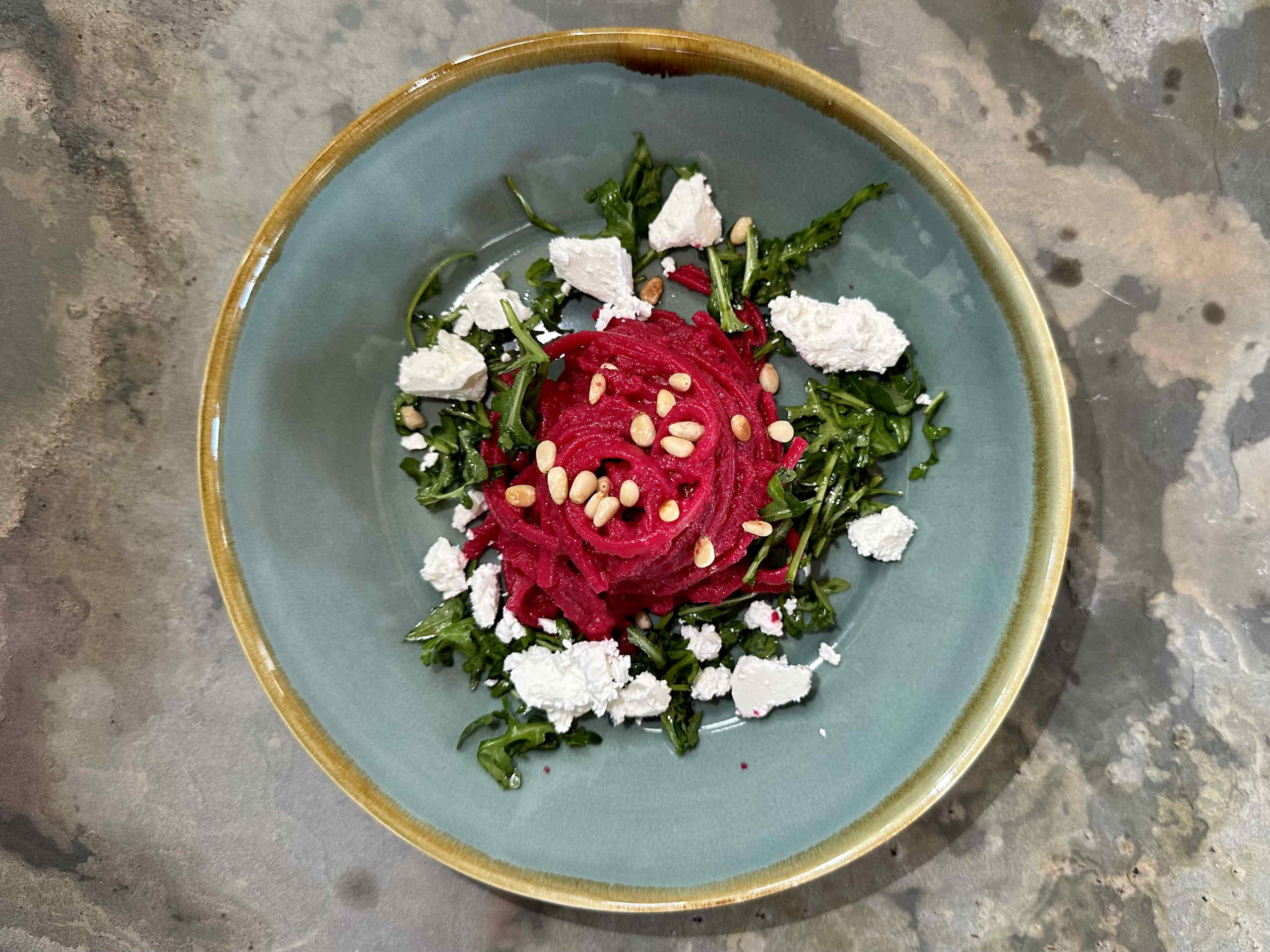 Beetroot pasta with feta cheese