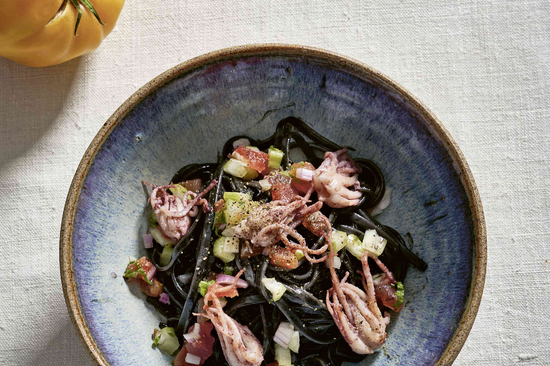 Pasta nera with calamari & tomatoes