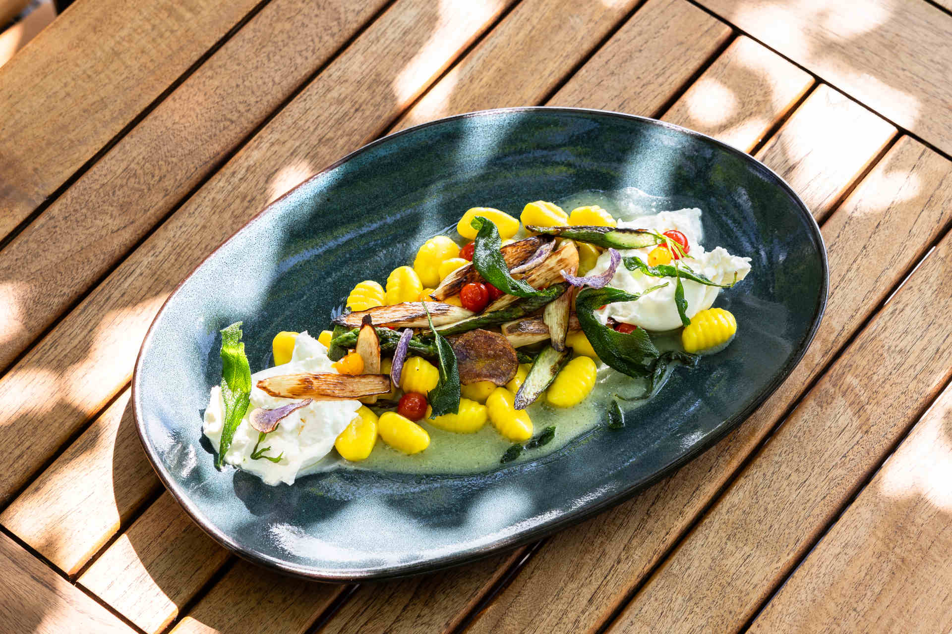 Mediterranean-inspired: asparagus gnocchi with burratina and wild garlic pesto